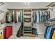 Large walk-in closet with ample storage and custom shelving at 9212 Linslade Way, Wake Forest, NC 27587