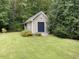 Exterior of a shed that could be used as a workshop or additional storage at 936 Elbridge Dr, Raleigh, NC 27603