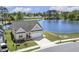 Beautiful aerial view of a single Gathering home and its proximity to a tranquil lake at 98 Buddy Campbell Ct, Angier, NC 27501