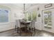 Cozy dining area with a large window, providing ample natural light and comfort at 98 Buddy Campbell Ct, Angier, NC 27501