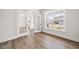 Office boasts hardwood floors, bright lighting, and stylish french doors at 000 Olivia Pope Way, Efland, NC 27243
