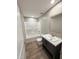 Cozy bathroom with a tub-shower combination, modern vanity, and neutral color scheme at 10 Riverview Rd, Erwin, NC 28339