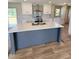 Modern kitchen with stainless steel appliances, a spacious island, and ample cabinet space at 10 Riverview Rd, Erwin, NC 28339
