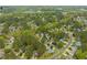 Aerial view of a Downtown Apex neighborhood showcasing tree-lined streets and charming homes at 101 Rustic Pine Ct, Apex, NC 27502