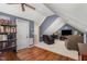 Attic bonus room featuring a reading nook and entertaining space at 101 Rustic Pine Ct, Apex, NC 27502