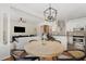 Open-concept dining area, seamlessly connecting to the kitchen and living spaces at 101 Rustic Pine Ct, Apex, NC 27502