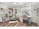 Bright home office with a functional workspace, comfortable chair, and ample storage solutions, perfect for productivity at 101 Rustic Pine Ct, Apex, NC 27502