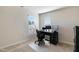Bedroom features a desk area and a window for natural light at 1016 Mirbeck Ln, Durham, NC 27713