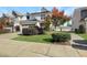 Charming home featuring well-maintained landscaping and a two-car garage at 1016 Mirbeck Ln, Durham, NC 27713