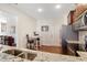 Bright kitchen with granite countertops, stainless steel appliances and a breakfast area at 1016 Mirbeck Ln, Durham, NC 27713