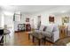 Spacious living room with hardwood floors, neutral decor, and an open floor plan at 1016 Mirbeck Ln, Durham, NC 27713