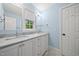 Bathroom features double vanity with modern fixtures and marble countertops at 104 Arcadia Ln, Chapel Hill, NC 27514