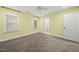 Light-filled bedroom with plush carpeting and large windows for ample light at 104 Arcadia Ln, Chapel Hill, NC 27514