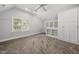 Spacious bedroom with vaulted ceiling, carpeted floor, built-in shelving and wardrobe at 104 Arcadia Ln, Chapel Hill, NC 27514