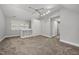 Bedroom features modern lighting, built-in storage, and plush carpeting at 104 Arcadia Ln, Chapel Hill, NC 27514