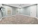 Spacious bedroom features plush carpeting, ceiling fan and lots of natural light at 104 Arcadia Ln, Chapel Hill, NC 27514