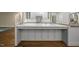 Stylish kitchen island with a white countertop and space for seating and food preparation at 104 Arcadia Ln, Chapel Hill, NC 27514