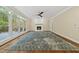Cozy living room with natural light and a fireplace creates a warm and inviting atmosphere at 104 Arcadia Ln, Chapel Hill, NC 27514