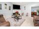 Cozy living room featuring a fireplace, neutral walls, and comfortable seating arrangements at 104 Hamby Ct, Garner, NC 27529