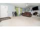 Bright living room featuring neutral walls, a cozy fireplace, and ample space for relaxation and entertainment at 104 Hamby Ct, Garner, NC 27529
