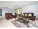 Inviting living room with comfortable seating, a fireplace, and a bright, airy atmosphere at 104 Hamby Ct, Garner, NC 27529