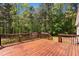 Large wooden back deck with view of yard and trees, perfect for entertaining at 105 Coral Ridge Cir, Franklinton, NC 27525