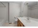 Bright bathroom featuring tub and shower combination with single sink vanity and chrome hardware at 105 Coral Ridge Cir, Franklinton, NC 27525