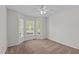 Bedroom featuring natural light, neutral walls, carpet, and ceiling fan at 105 Coral Ridge Cir, Franklinton, NC 27525