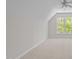 Bonus room with carpet, a window with natural light and neutral walls at 105 Coral Ridge Cir, Franklinton, NC 27525