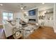 Bright living room with a modern fireplace, built-in shelving, and contemporary furnishings at 108 Clements Dr, Morrisville, NC 27560