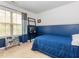 Bright bedroom with modern style featuring a comfy bed, ladder desk, and lots of natural light at 111 Gathering Place Pl, Durham, NC 27713