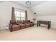 Inviting bonus room with theater seating, foosball table, and a projector for entertainment at 111 Gathering Place Pl, Durham, NC 27713