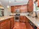 Spacious kitchen with stainless steel appliances and granite countertops at 111 Gathering Place Pl, Durham, NC 27713
