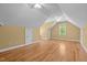 Large attic space with hardwood floors and interesting architecture at 121 Westchase Run, Sanford, NC 27330