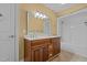 Bathroom boasts double sink vanity with tile flooring and a tub at 121 Westchase Run, Sanford, NC 27330