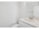 Bathroom featuring neutral walls, a vanity, and toilet at 1215 Corkery Ridge Ct, Cary, NC 27519