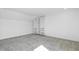Bedroom with closet system and neutral colored carpet and walls at 1215 Corkery Ridge Ct, Cary, NC 27519