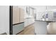 Modern kitchen features stainless steel appliances, granite countertops, and an island at 1215 Corkery Ridge Ct, Cary, NC 27519