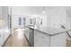 Bright kitchen with a large island with stainless steel appliances and granite countertops at 1215 Corkery Ridge Ct, Cary, NC 27519