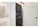 Laundry room featuring washer and dryer combo with doorway access to bathroom at 1215 Corkery Ridge Ct, Cary, NC 27519