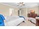 Relaxing bedroom with natural light, soft carpet, and decorative elements at 12308 Bunchgrass Ln, Raleigh, NC 27614