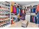 Walk-in closet featuring ample shelving for shoes and organized clothes at 12308 Bunchgrass Ln, Raleigh, NC 27614