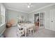 Bright and airy playroom with large windows, neutral walls and carpet at 1305 Reservoir View Ln, Wake Forest, NC 27587