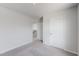 Bedroom with neutral carpet and a doorway to another room at 137 Lillian Ct, Roxboro, NC 27573