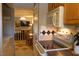 A view from the kitchen looking into a living room with a dining table and chairs at 1505 Kendall Dr, Durham, NC 27703