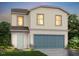 Charming two-story home features a blue garage door and canyon clay colored siding at 155 Lillian Ct, Roxboro, NC 27573