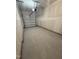 A single-car garage has an automatic door opener and a concrete floor at 168 Parker Ln, Mebane, NC 27302