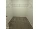 Walk-in closet with gray carpeting, wire shelving and a door on the left at 172 Parker Ln, Mebane, NC 27302