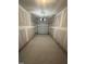 Empty one-car garage with concrete floor and unfinished drywall at 172 Parker Ln, Mebane, NC 27302