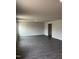 Open living room featuring hard surface floors, neutral colored walls and recessed lighting at 173 Lillian Ct, Roxboro, NC 27573
